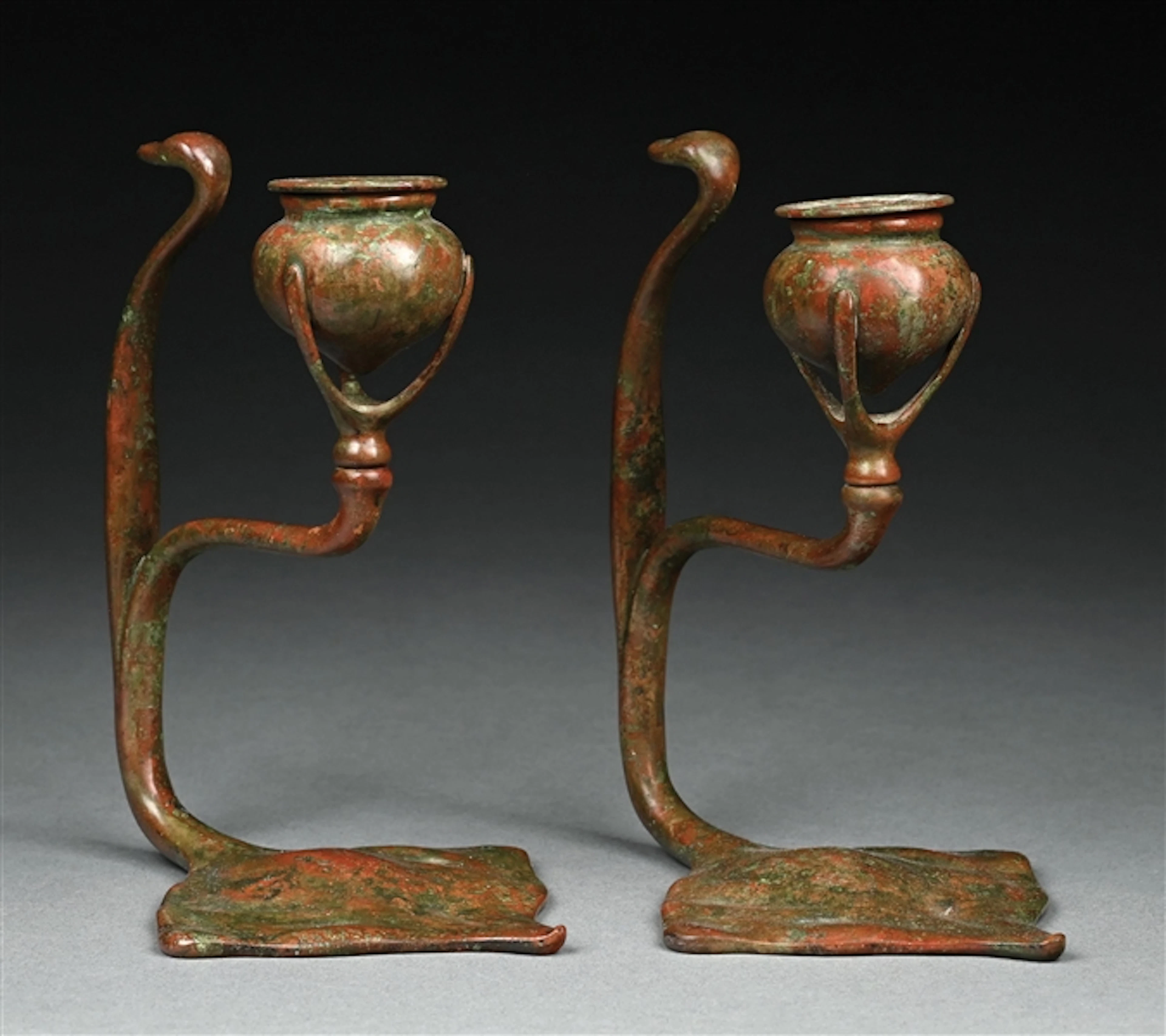 MATCHING PAIR OF TIFFANY STUDIOS COBRA FORM CANDLESTICKS