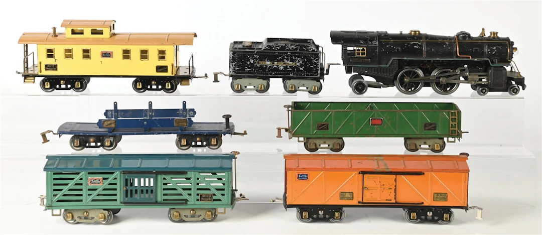 LOT OF 7: AMERICAN FLYER #4680 STEAM LOCO & FIVE FREIGHT CARS