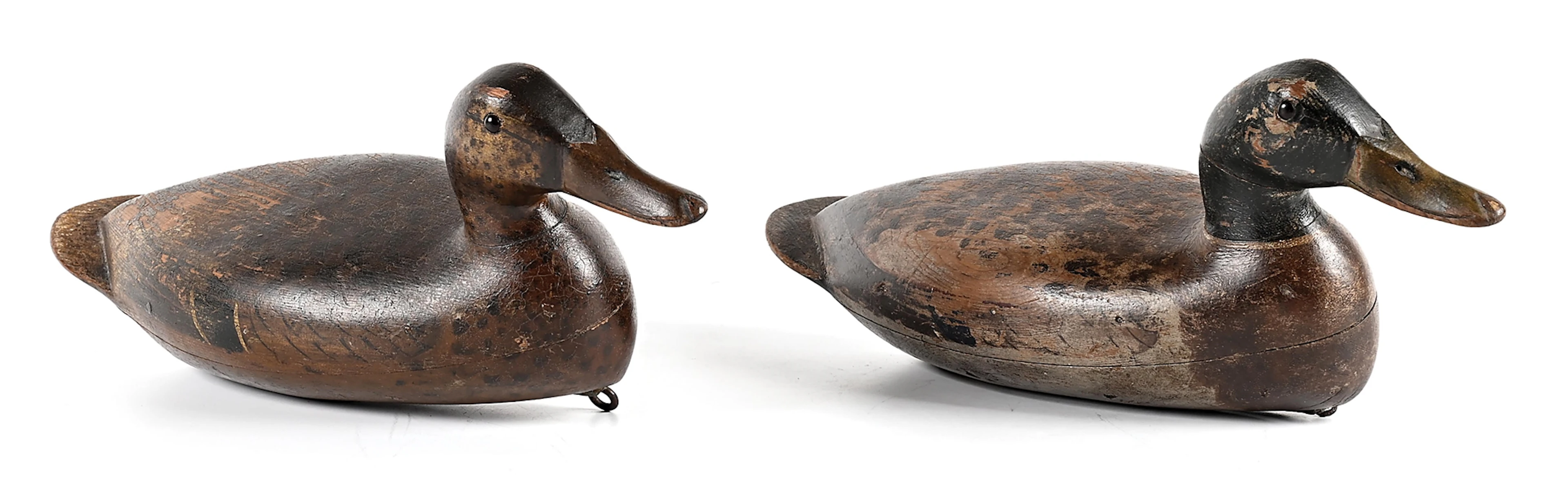 A PAIR OF VINTAGE WOODEN DUCK DECOYS