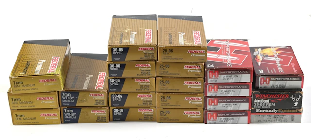 LOT OF 22 FULL BOXES OF CRISP COMMERCIAL AMMUNITION.