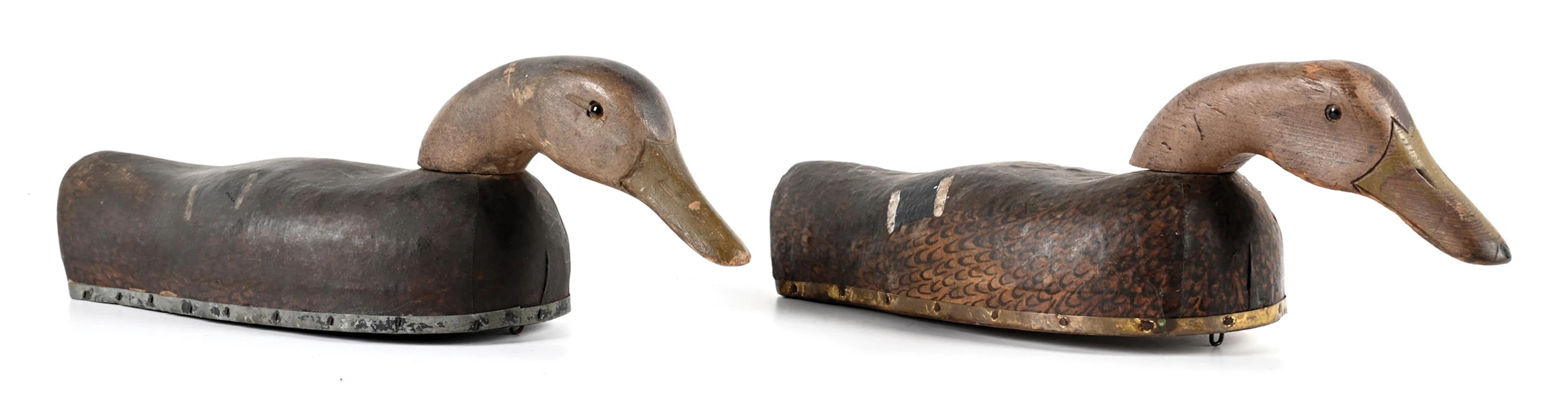 A PAIR OF VINTAGE WOODEN DUCK DECOYS