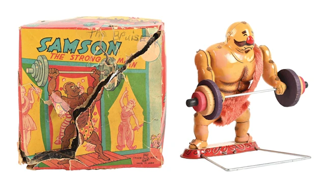 TPS “SAMSON THE STRONG MAN” TIN-LITHOGRAPHED WIND-UP TOY WITH ORIGINAL BOX.