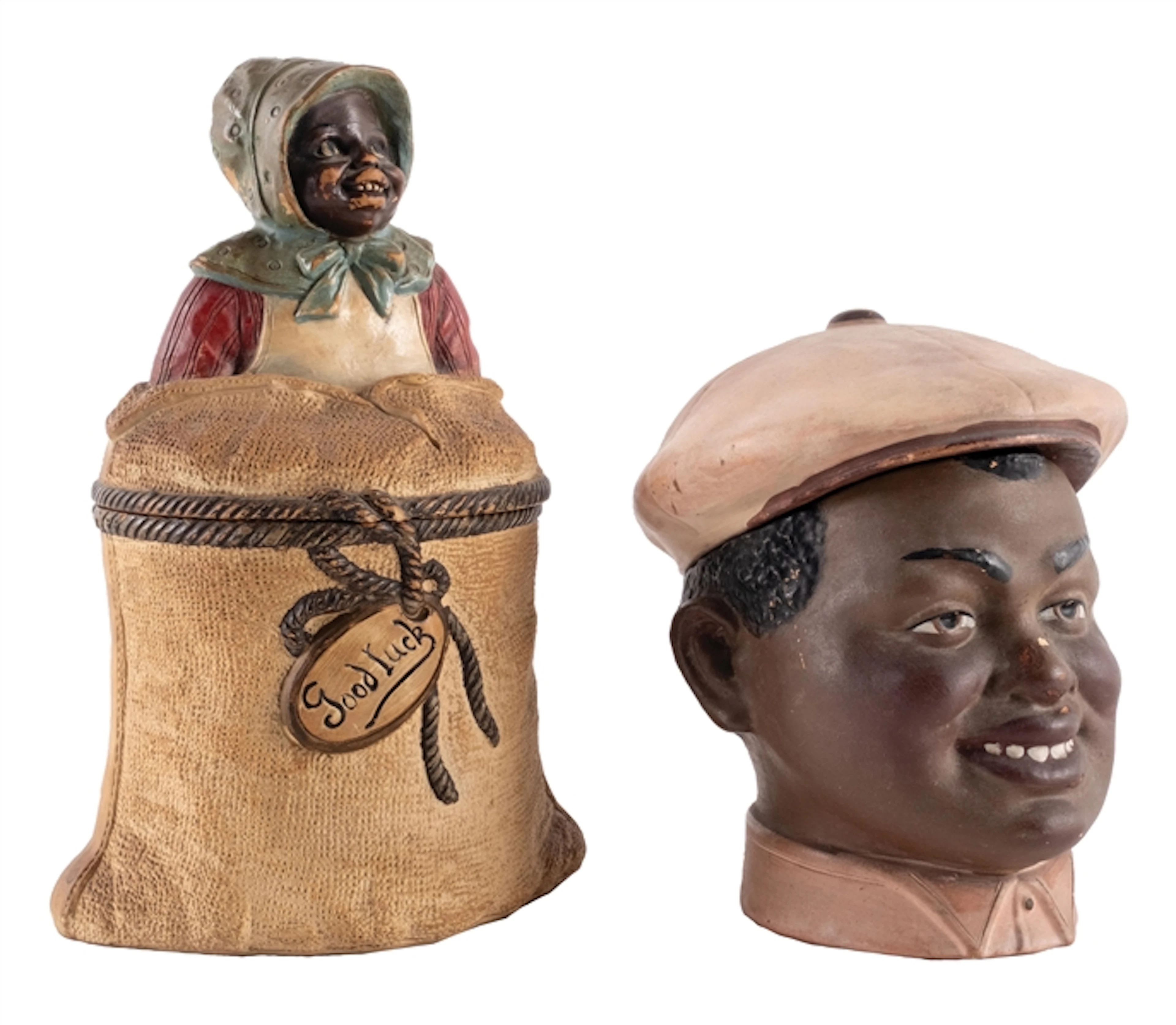 PAIR OF BLACK AMERICANA TOBACCO CANISTERS