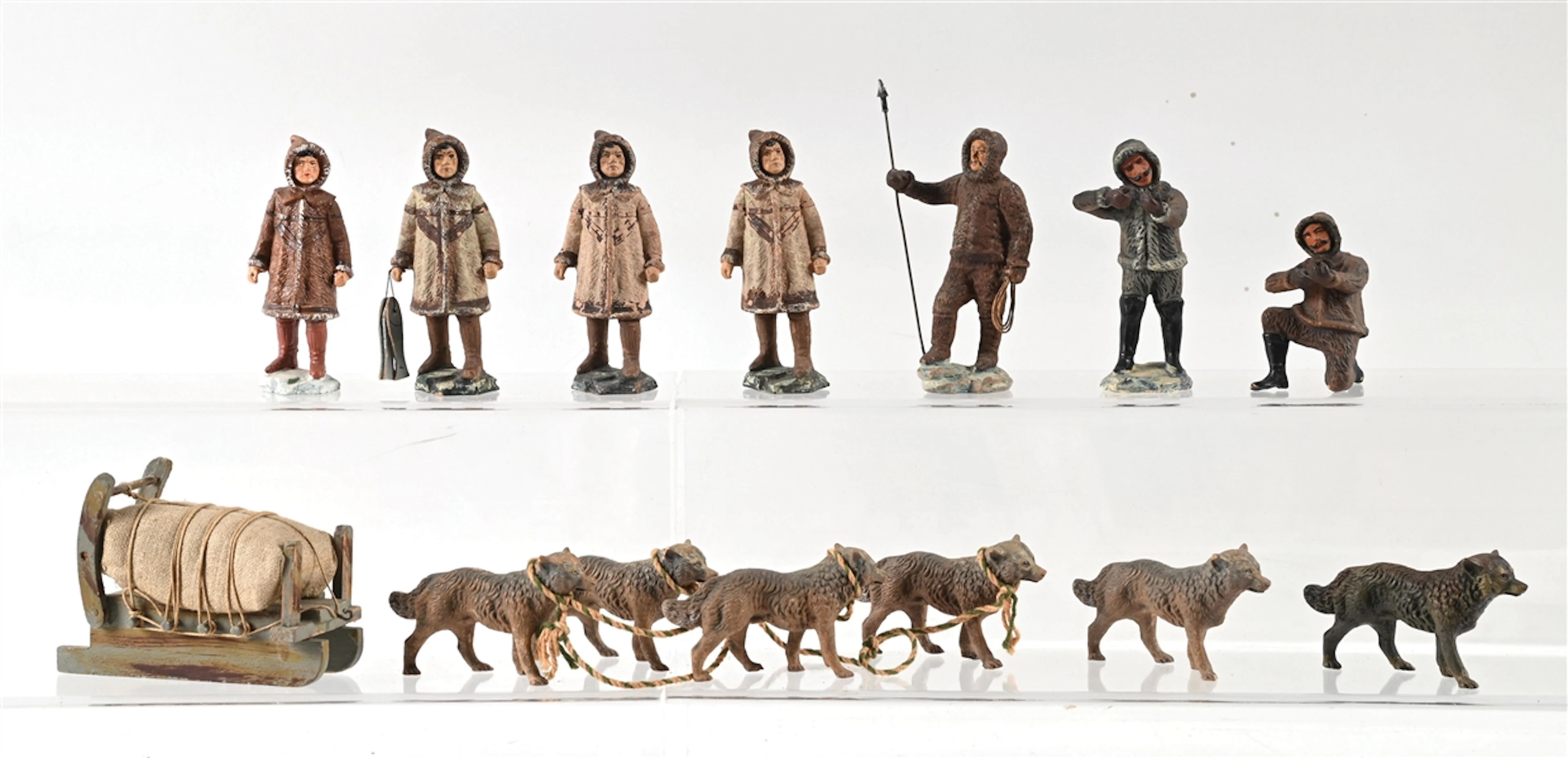 TIPPLE-TOPPLE ARCTIC DOG SLED W/ ESKIMOS, 14 PIECES