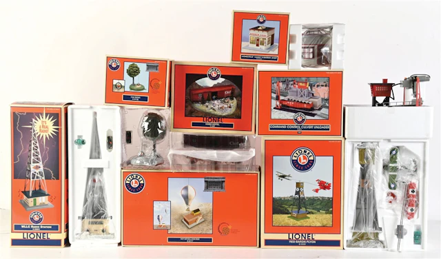 LOT OF 7: VARIOUS MODERN ERA LIONEL O-GA. BOXED TRAIN ACCESSORIES