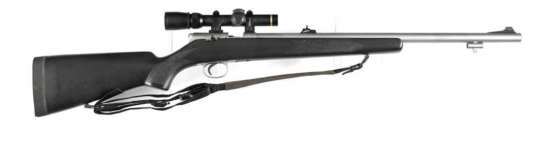 (A) WHITE G SERIES WHITETAIL .504 INLINE PERCUSSION RIFLE WITH LEUPOLD SCOPE.
