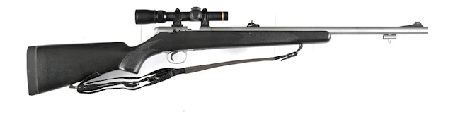 (A) WHITE G SERIES WHITETAIL .504 INLINE PERCUSSION RIFLE WITH LEUPOLD SCOPE.