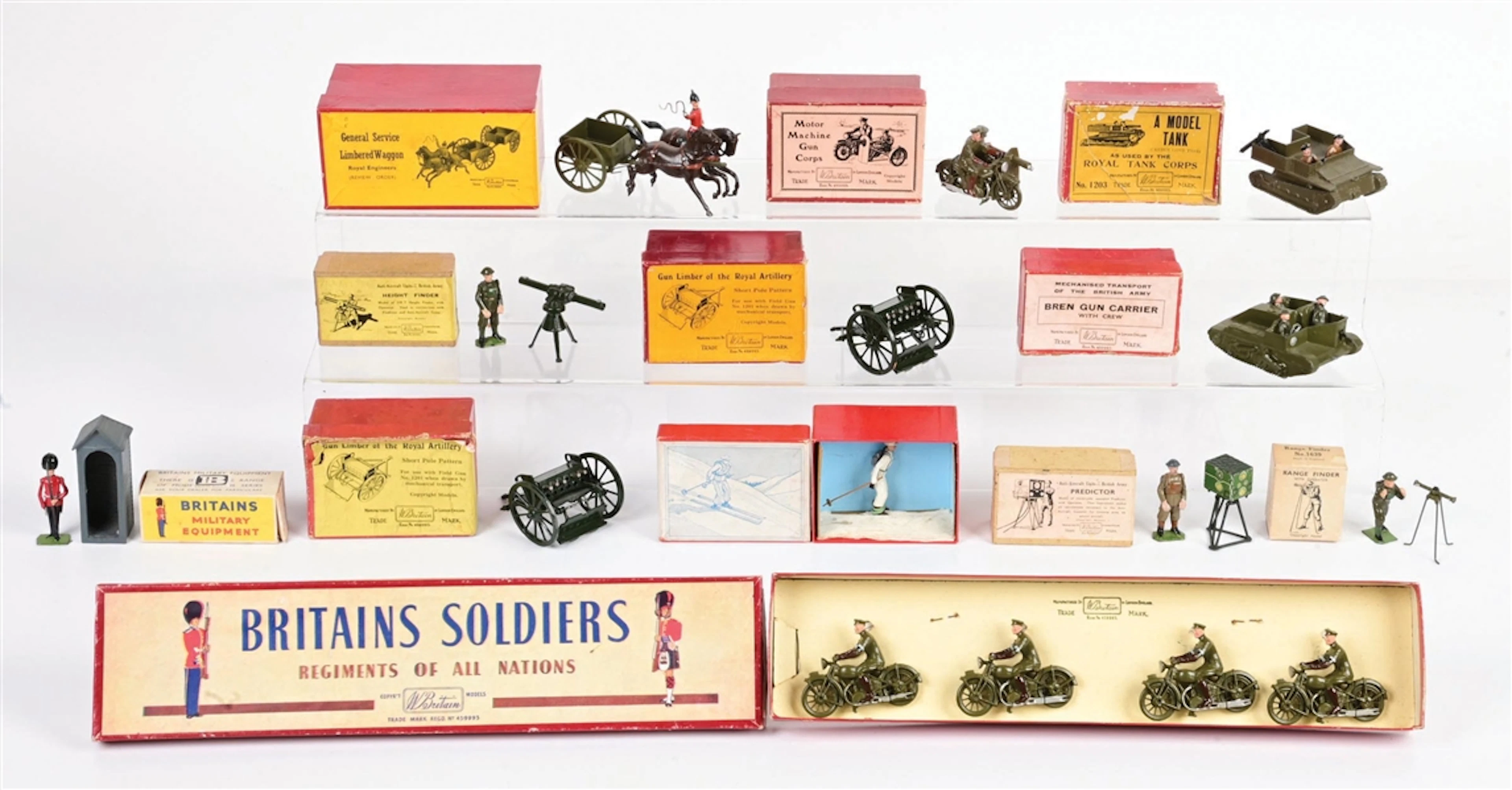 LOT OF 12: W. BRITAINS MILITARY EQUIPMENT