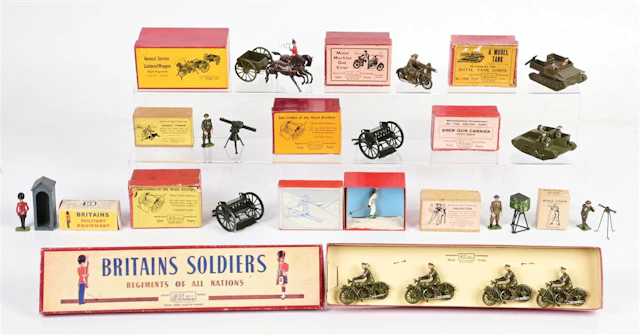 LOT OF 12: W. BRITAINS MILITARY EQUIPMENT