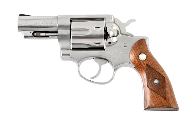 (C) RUGER POLICE SERVICE SIX DOUBLE ACTION REVOLVER.