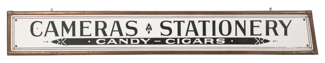 VERTICAL "CAMERAS-STATIONERY-CANDY-CIGARS" SIGN
