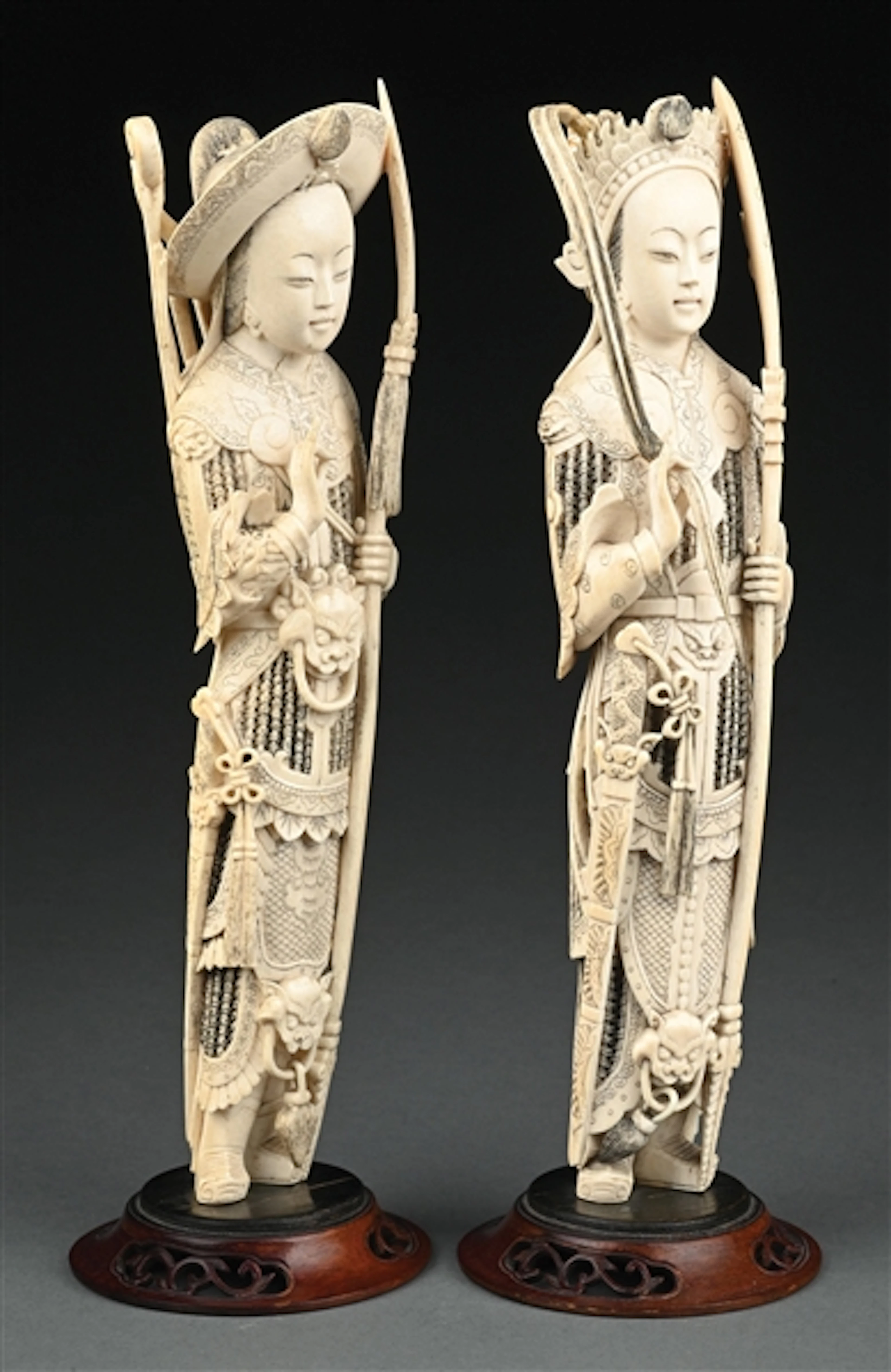 PAIR OF CARVED IVORY FIGURINES
