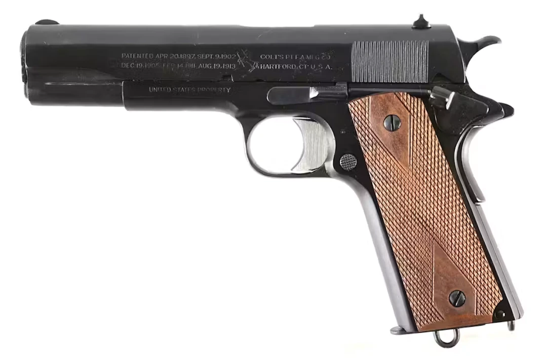 (C) COLT MODEL 1911 SEMI-AUTOMATIC PISTOL.