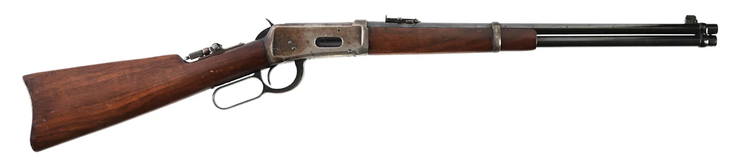 (C) PRE-WAR WINCHESTER MODEL 1894 LEVER ACTION CARBINE.