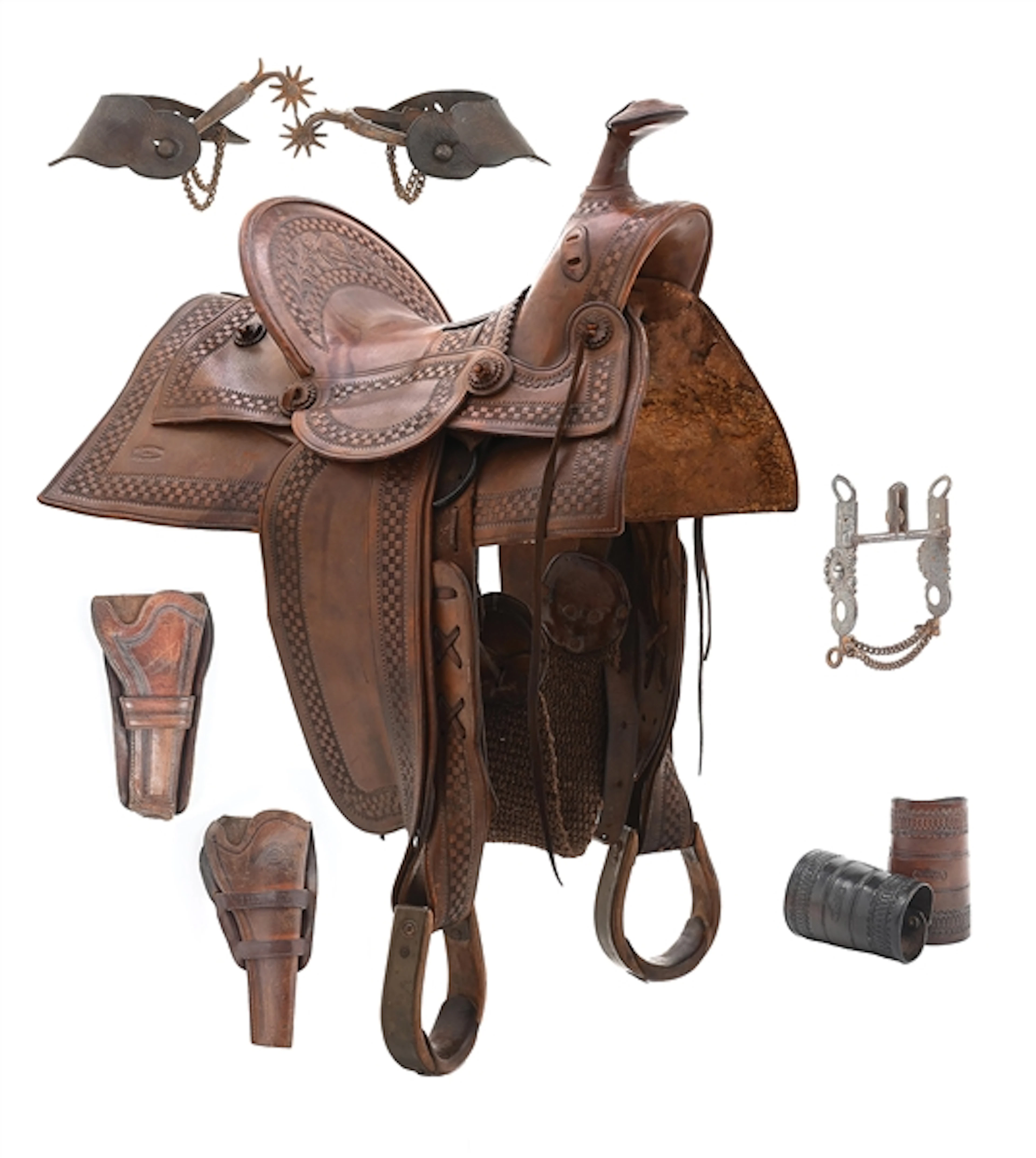 HISTORICAL AL FURSTNOW MONTANA SADDLE, SPURS, BIT, TWO HOLSTERS AND CUFFS