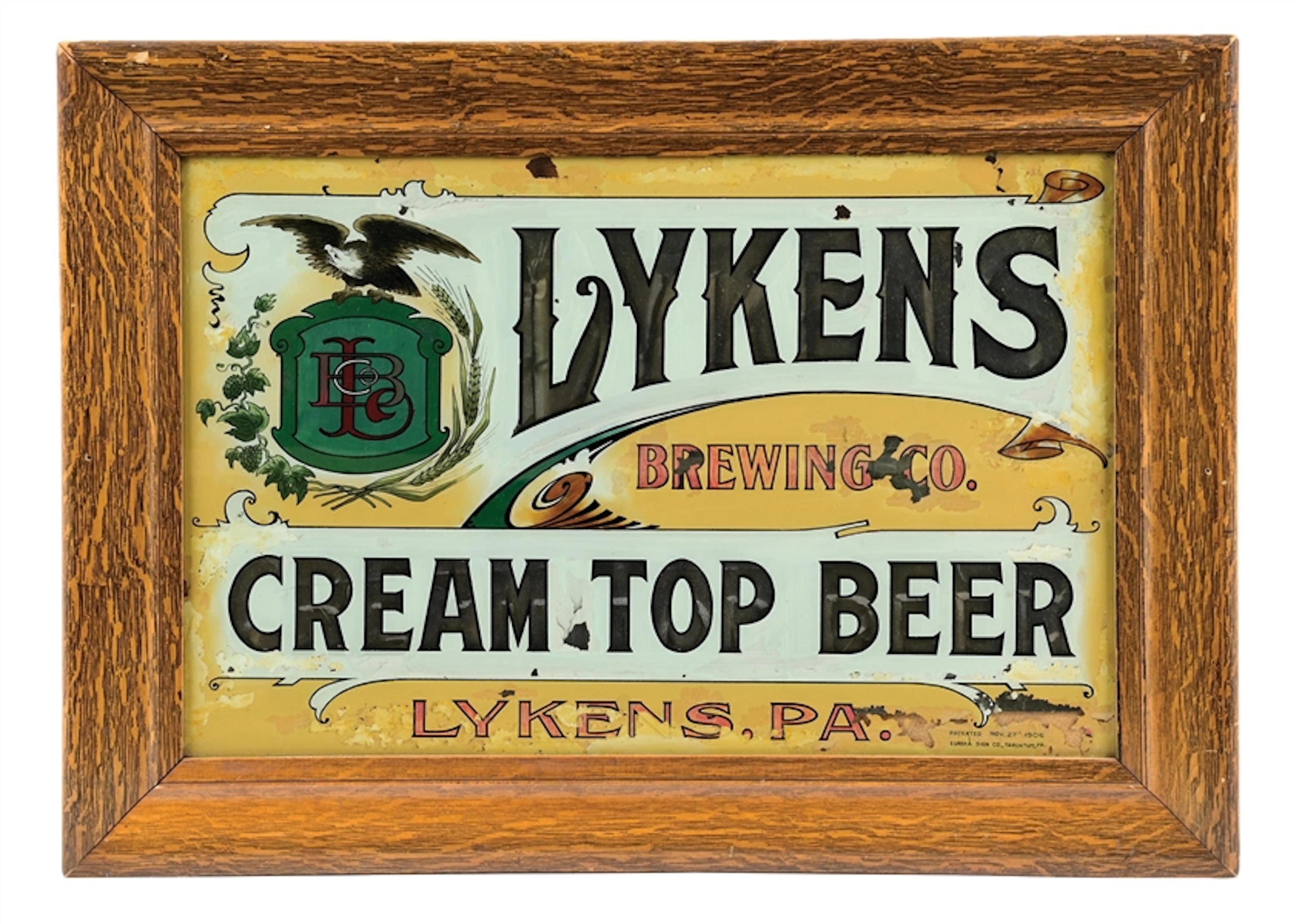 LYKENS CREAM TOP BEER REVERSE PAINTED GLASS SIGN