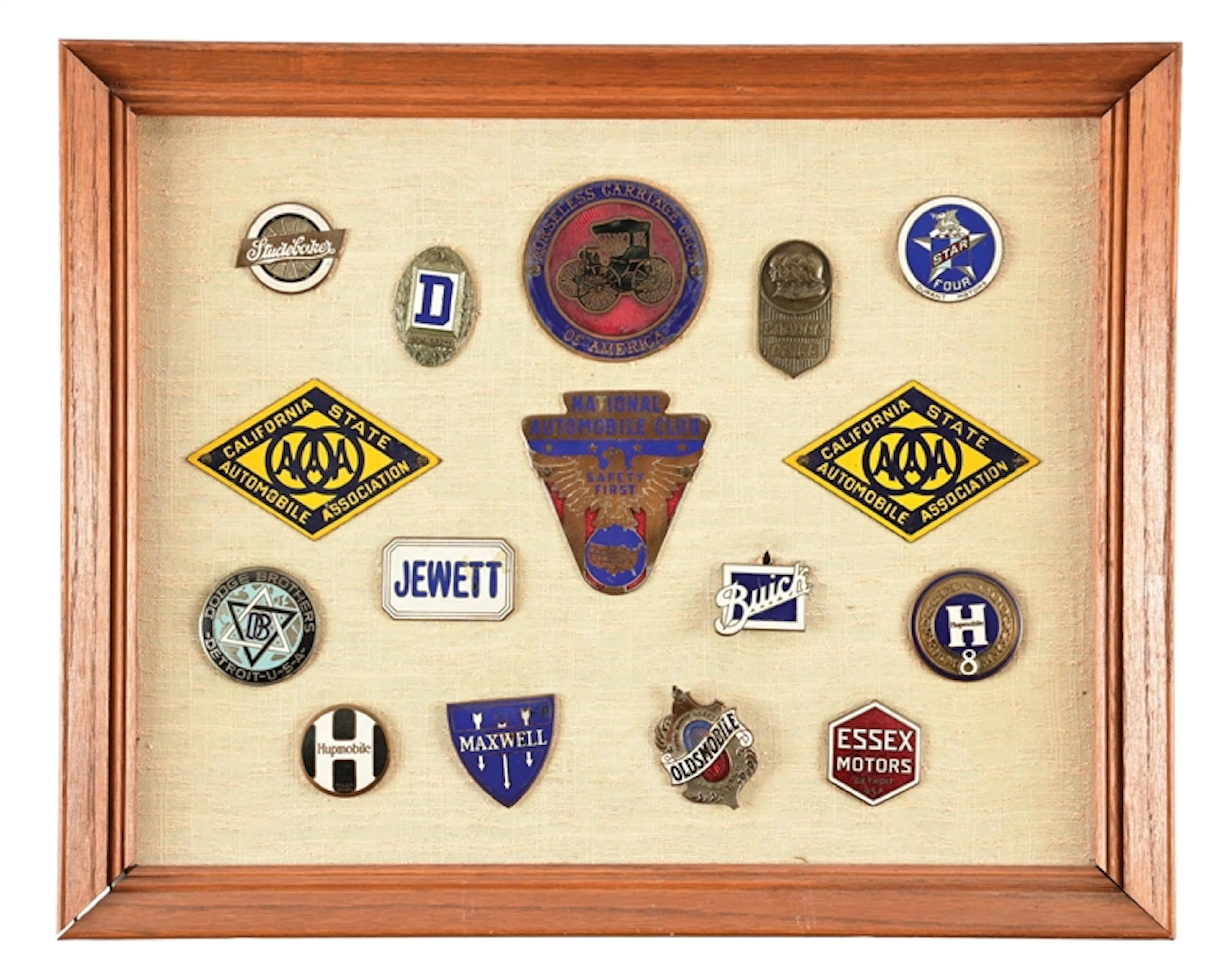 FRAMED AUTOMOBILE & RADIATOR BADGE COLLECTION.