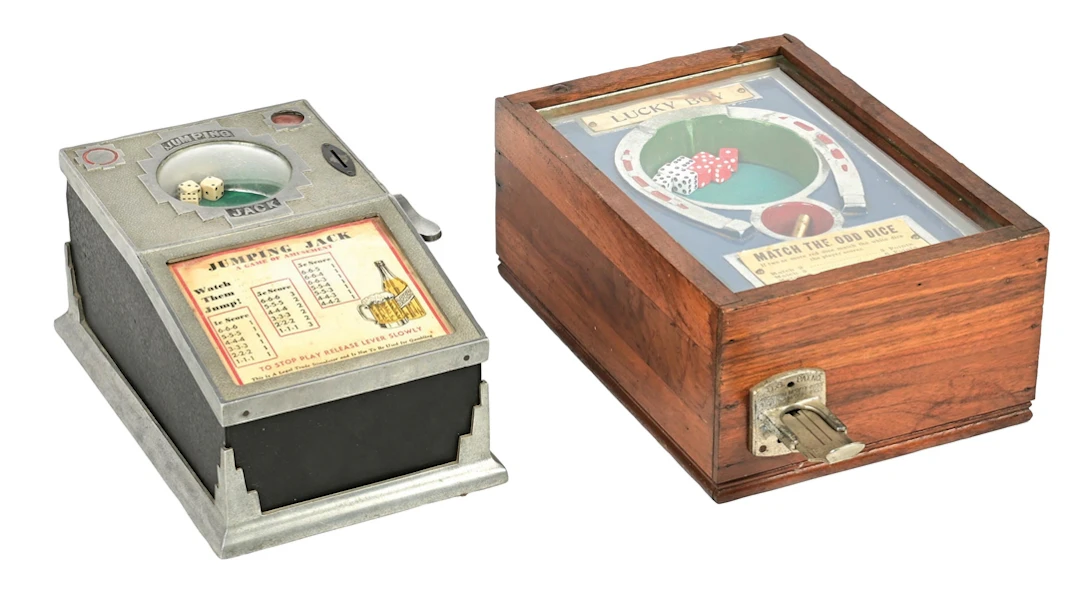 A PAIR OF TRADE STIMULATORS: JUMPING JACK AND LUCKY BOY COUNTERTOP DICE GAMES