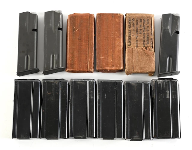 LOT OF M1 CARBINE AND INGLIS HI POWER MAGAZINES.