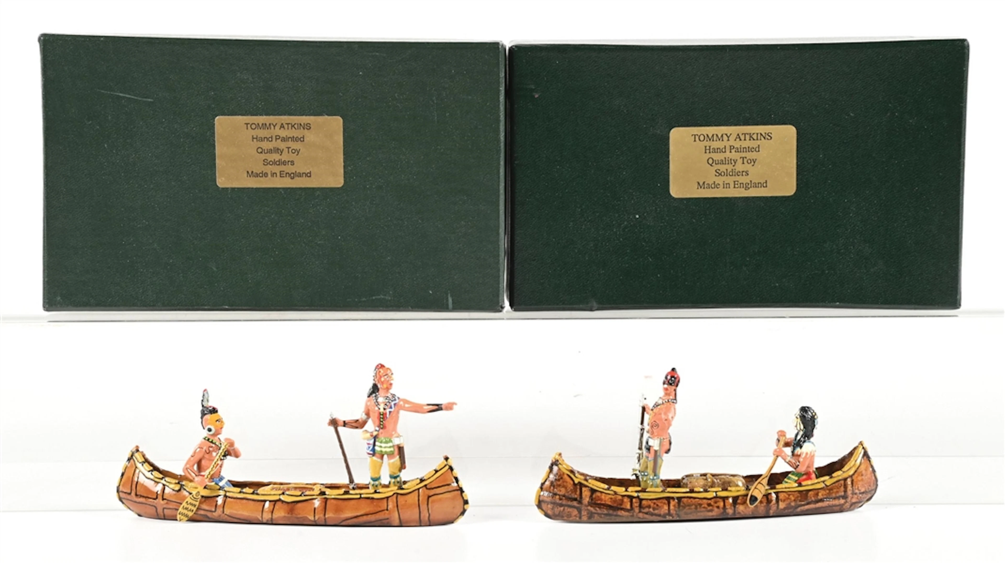 LOT OF 2: TOMMY ATKINS HAND-PAINTED INDIANS IN CANOE IN BOXES