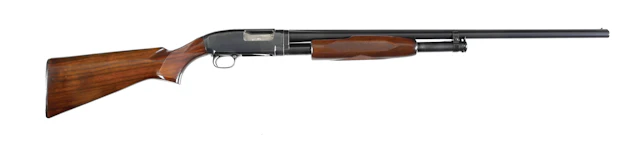 (C) WINCHESTER MODEL 12 SLIDE ACTION 20 GAUGE SHOTGUN.