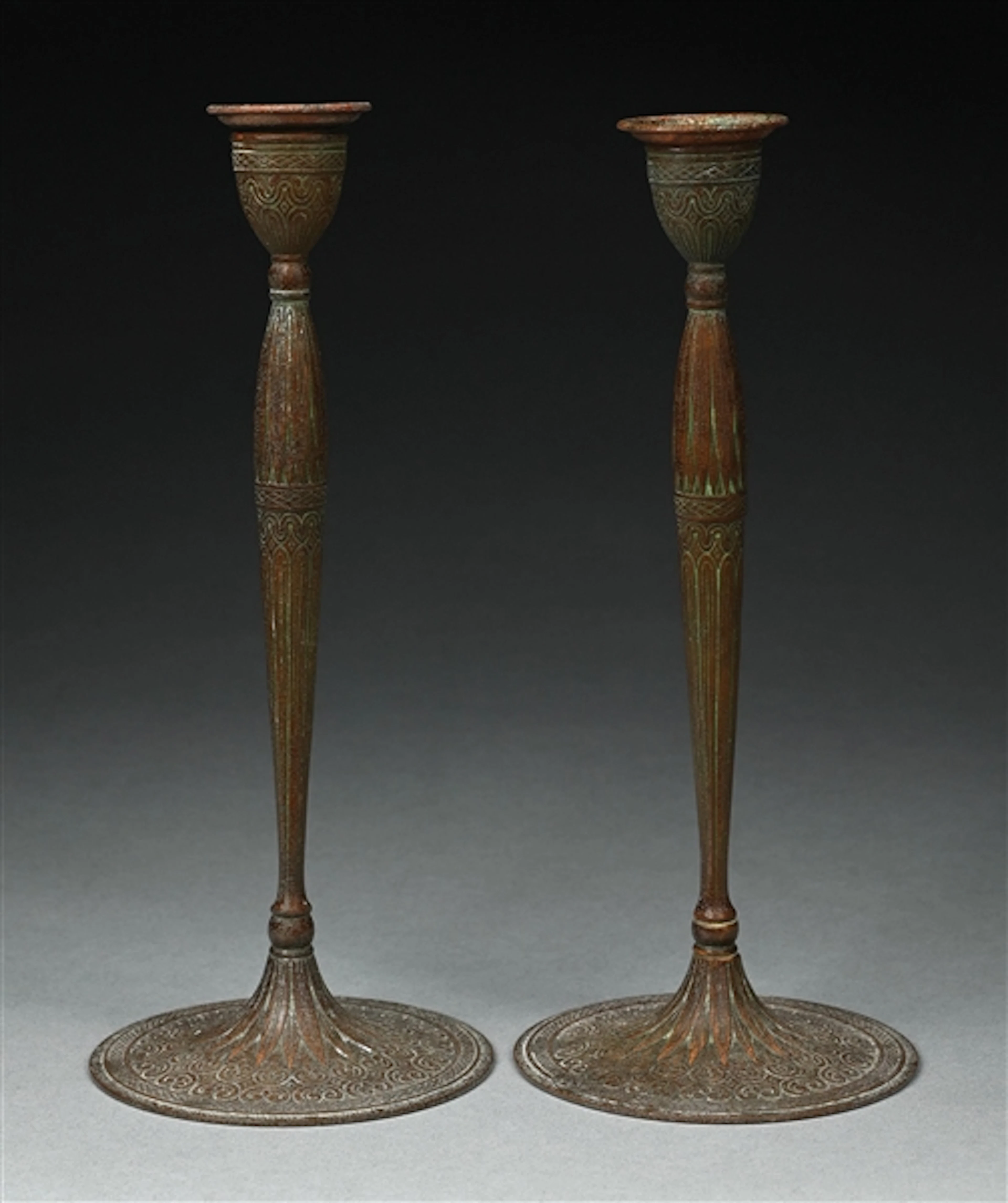PAIR OF TIFFANY STUDIOS BRONZE CANDLESTICKS