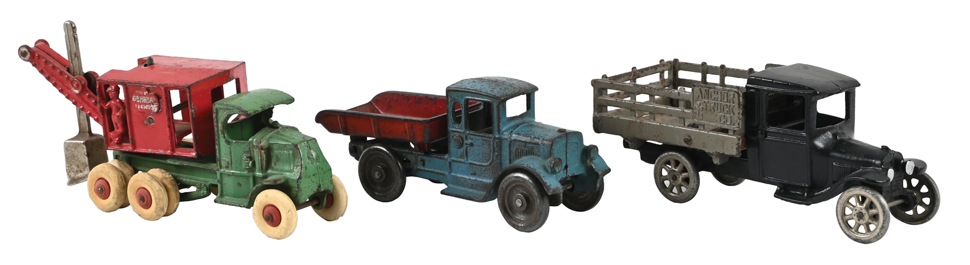 LOT OF 3: CAST IRON DUMP TRUCKS AND CRANE