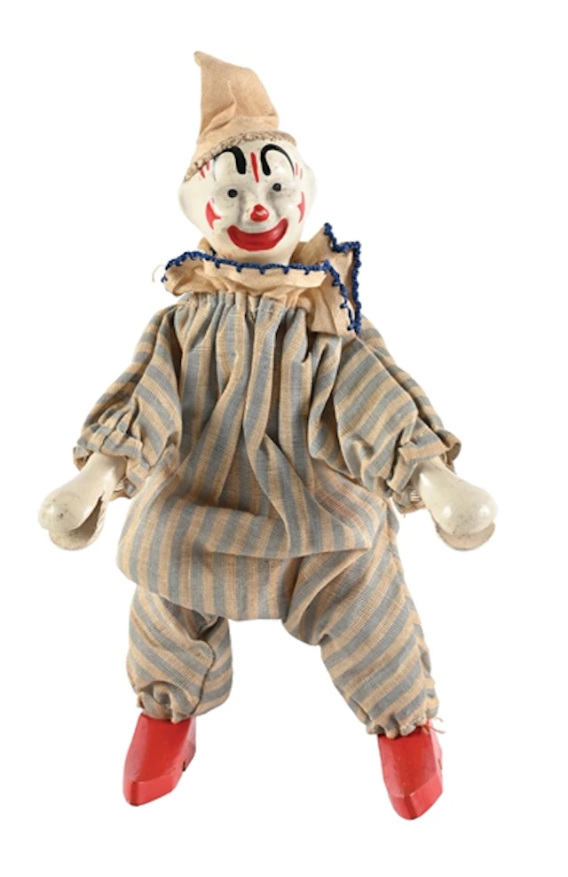 CLOTH AND COMPOSITION CLOWN DOLL WITH WOODEN HANDS AND FEET