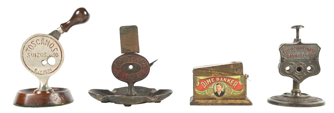 COLLECTION OF 4: ASSORTED ADVERTISING CAST IRON CIGAR CUTTERS