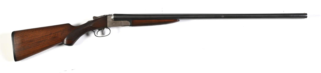 (C) ITHACA NID 12 GAUGE SIDE BY SIDE SHOTGUN (1927).