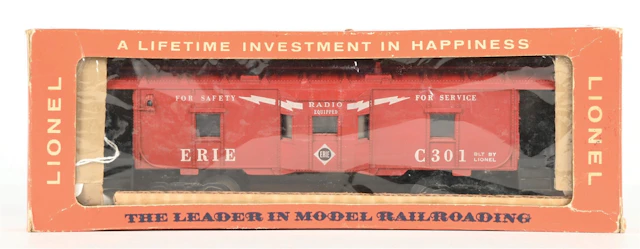 LIONEL POSTWAR O. GAUGE NO. 6517-75 ERIE BAY WINDOW CABOOSE WITH ORIGINAL BOX