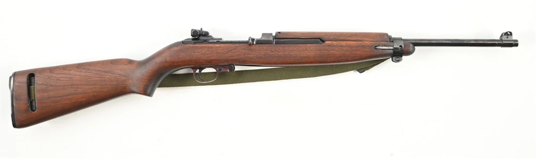 (C) INLAND M1 CARBINE SEMI-AUTOMATIC RIFLE.