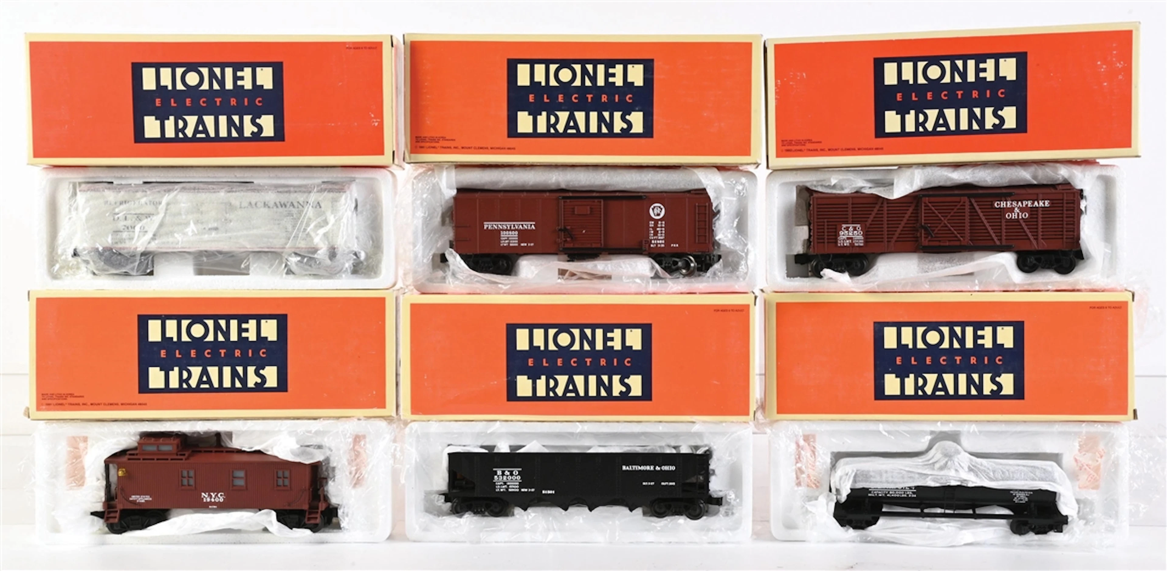 LOT OF 6: LIONEL O. GAUGE MODERN ERA SEMI-SCALE FREIGHT CARS WITH