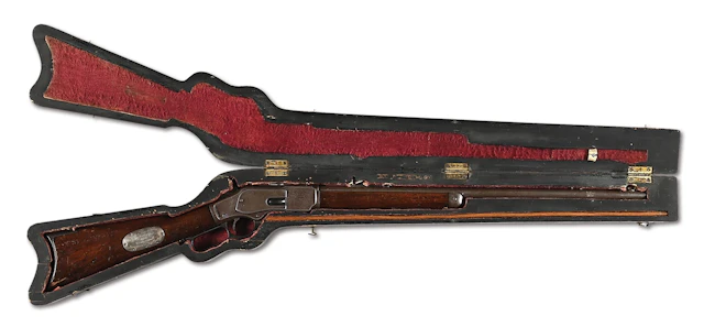 (A) CASED WINCHESTER 1873 .38 WCF LEVER ACTION RIFLE WITH BUFFALO
