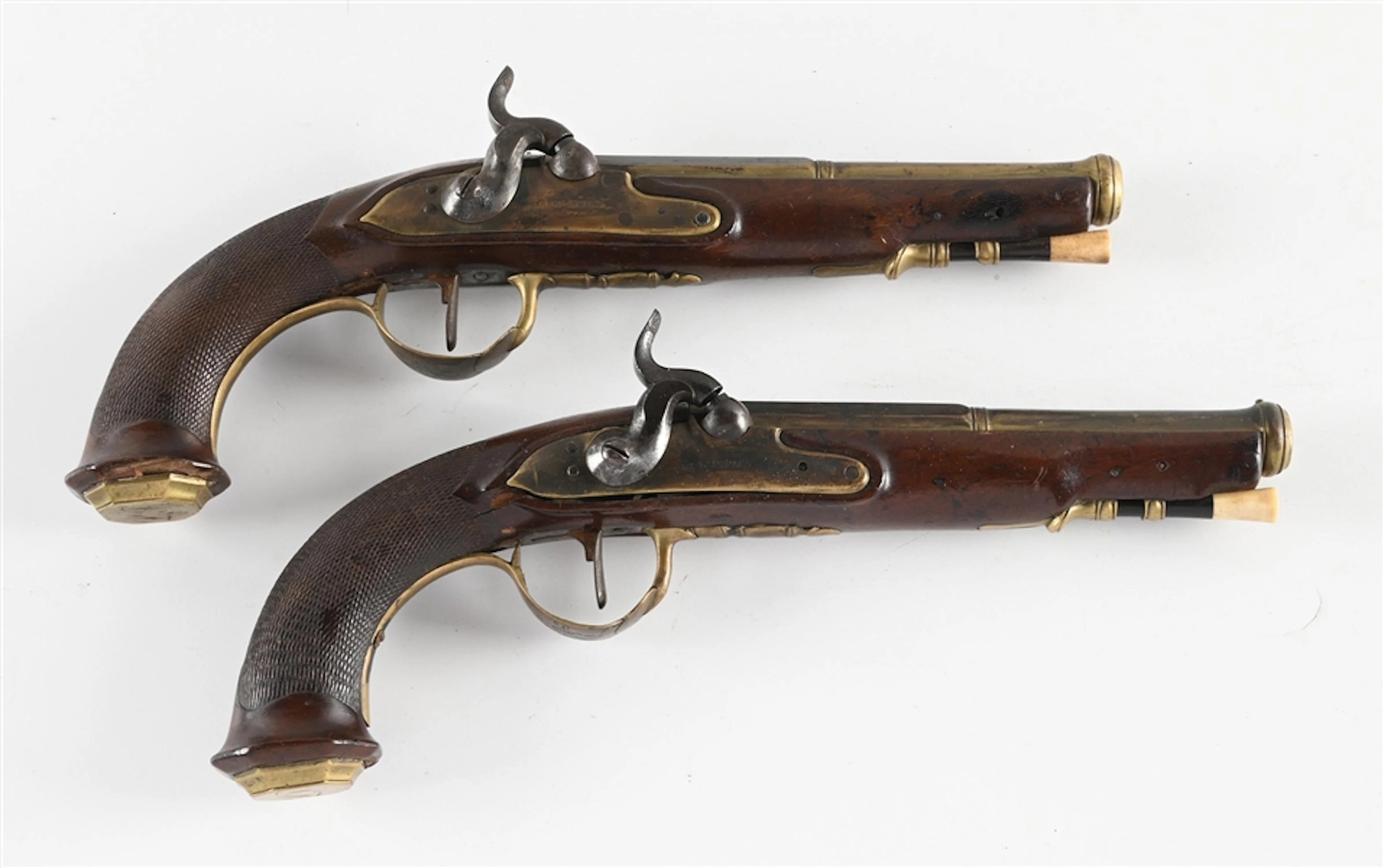 (A) A BRACE OF A.W. SPIES MARKED BRASS BARRELED PERCUSSION PISTOLS.