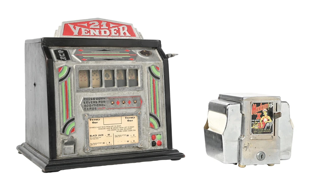 A PAIR OF COIN OPERATED MACHINES: GROETCHEN 21 VENDER & MADAM X NAPKIN