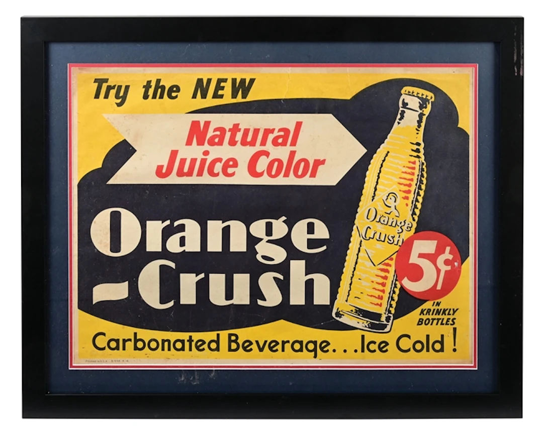ORANGE-CRUSH "TRY THE NEW NATURAL JUICE COLOR" FRAMED CARDSTOCK SIGN.
