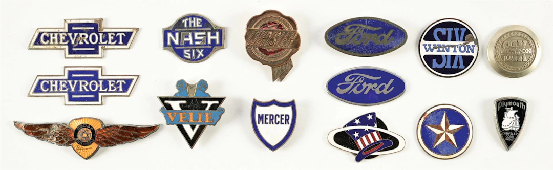 COLLECTION OF 14: ASSORTED AUTOMOTIVE RADIATOR BADGES