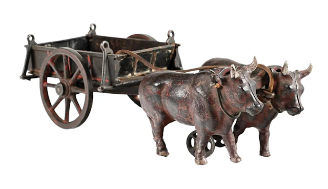 WELKER & CROSBY CAST IRON OX CART