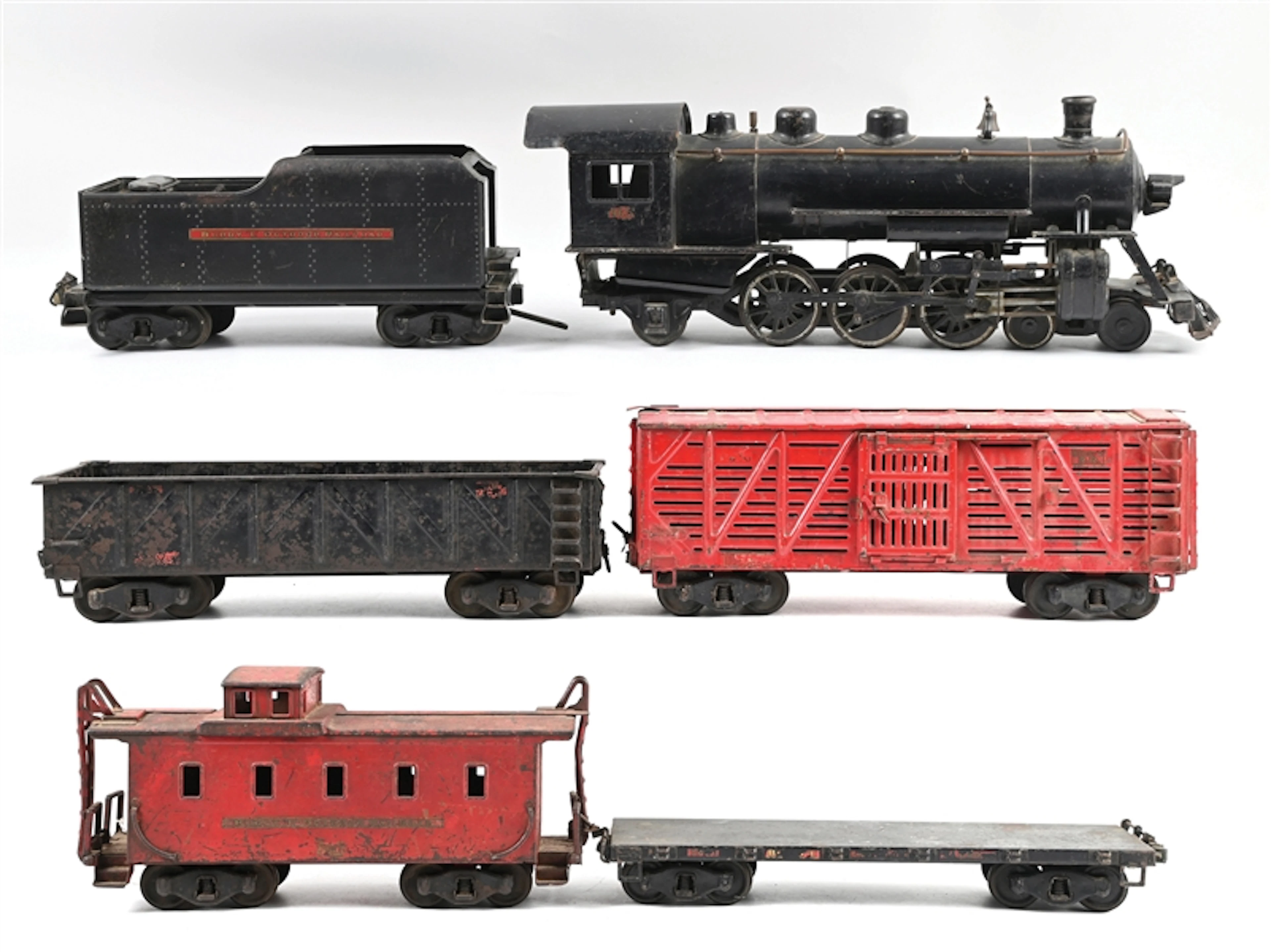 LOT OF 6: BUDDY "L" OUTDOOR RAILROAD STEAM LOCOMOTIVE W/ FOUR FREIGHT CARS