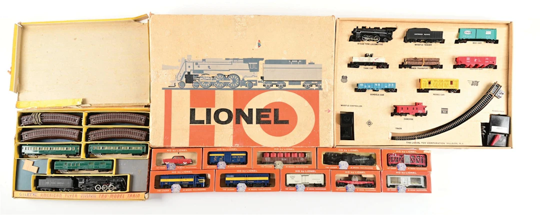 LOT OF 12: LIONEL & AMERICAN FLYER HO-GA. MODEL TRAIN SETS & ASSORTED CARS