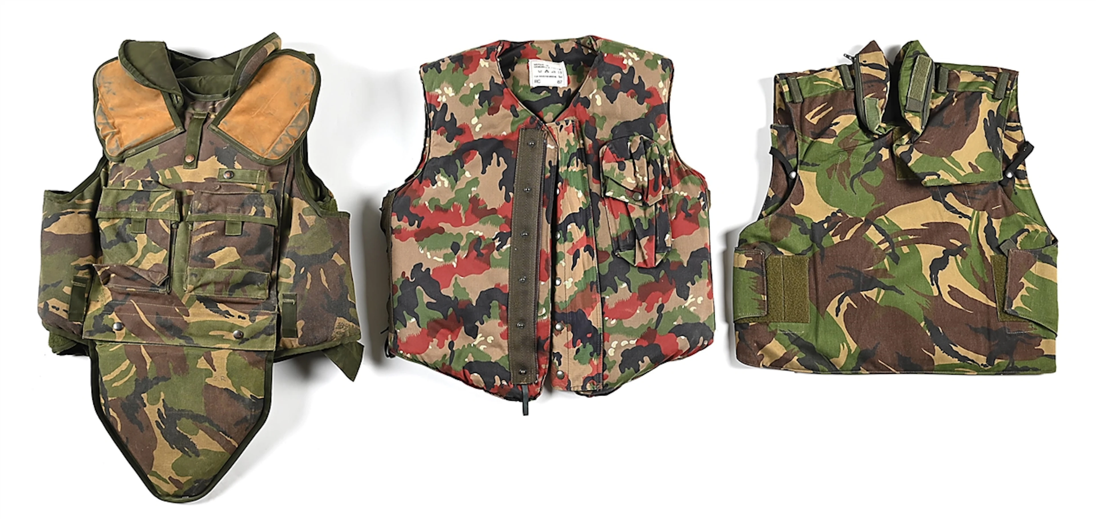 LOT OF 3: GERMAN, SWISS, AND DUTCH FLAK JACKETS.