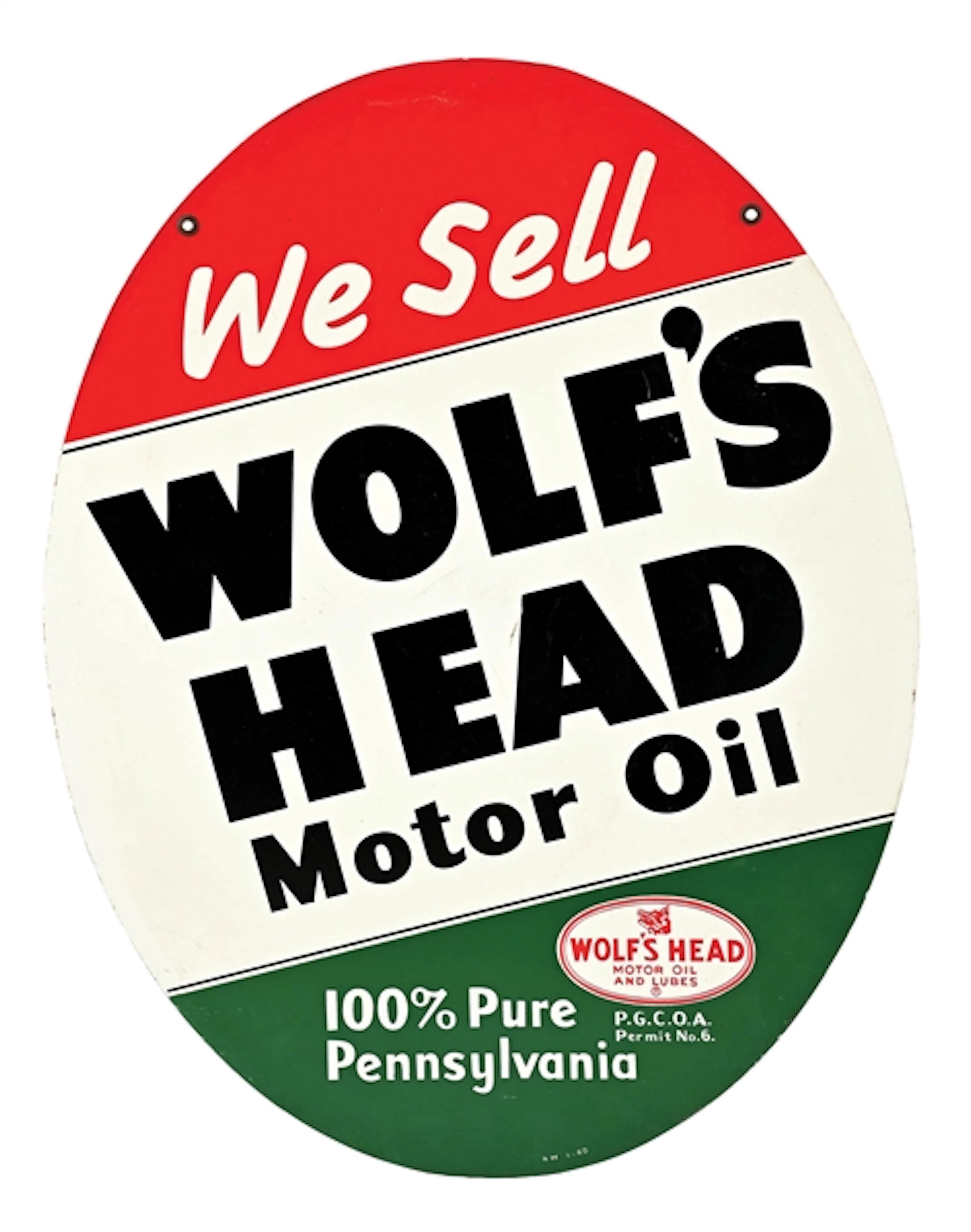 WE SELL WOLF'S HEAD MOTOR OIL TIN SIGN