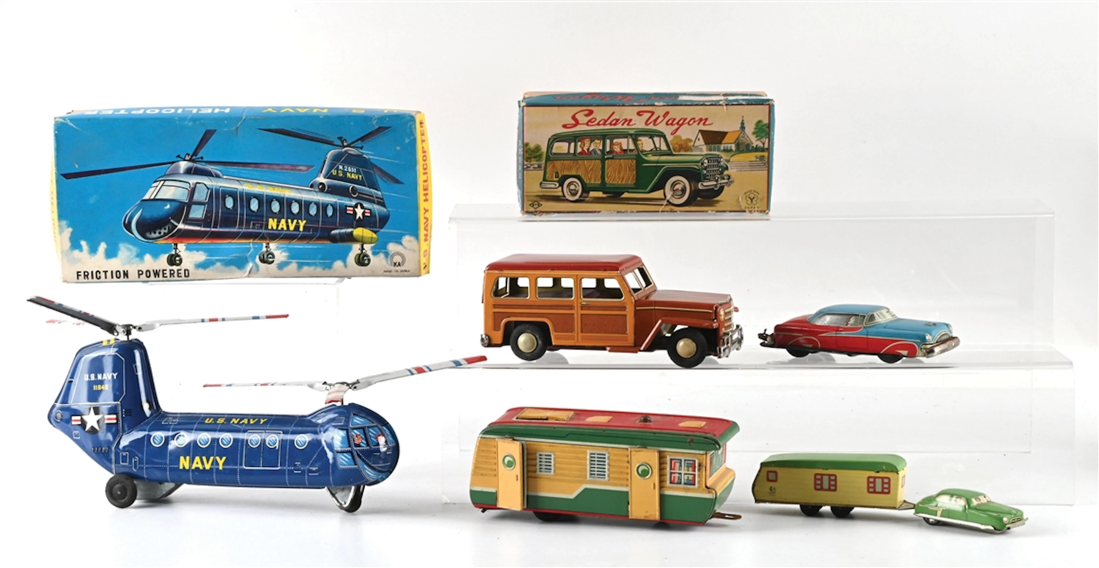 LOT OF 4: TIN CARS WITH CAMPING TRAILERS, U.S. NAVY HELICOPTER AND