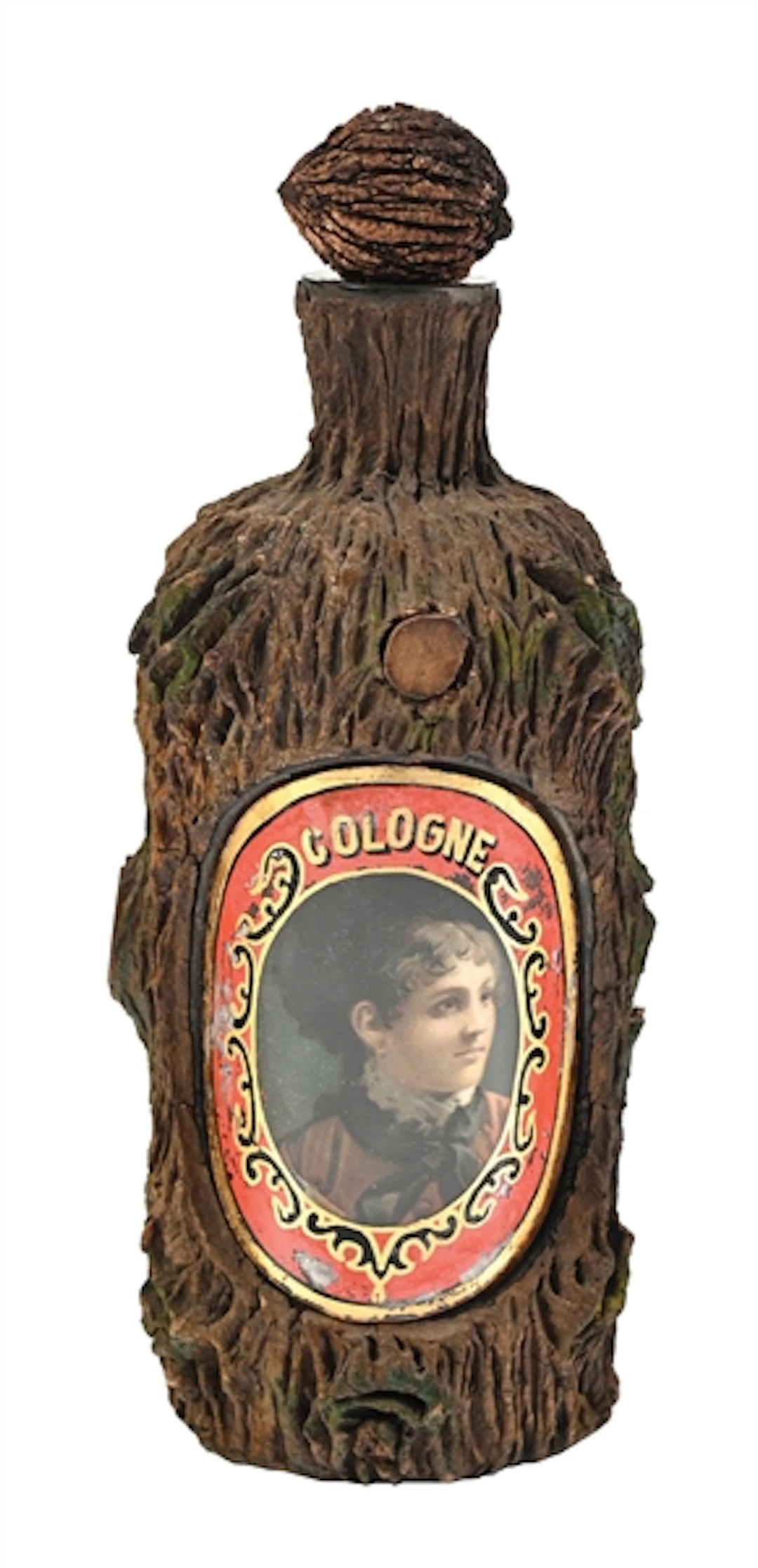 BARK-COVERED “COLOGNE” BARBER BOTTLE WITH PORTRAIT LABEL