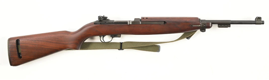 (C) INLAND M1 CARBINE SEMI-AUTOMATIC RIFLE.