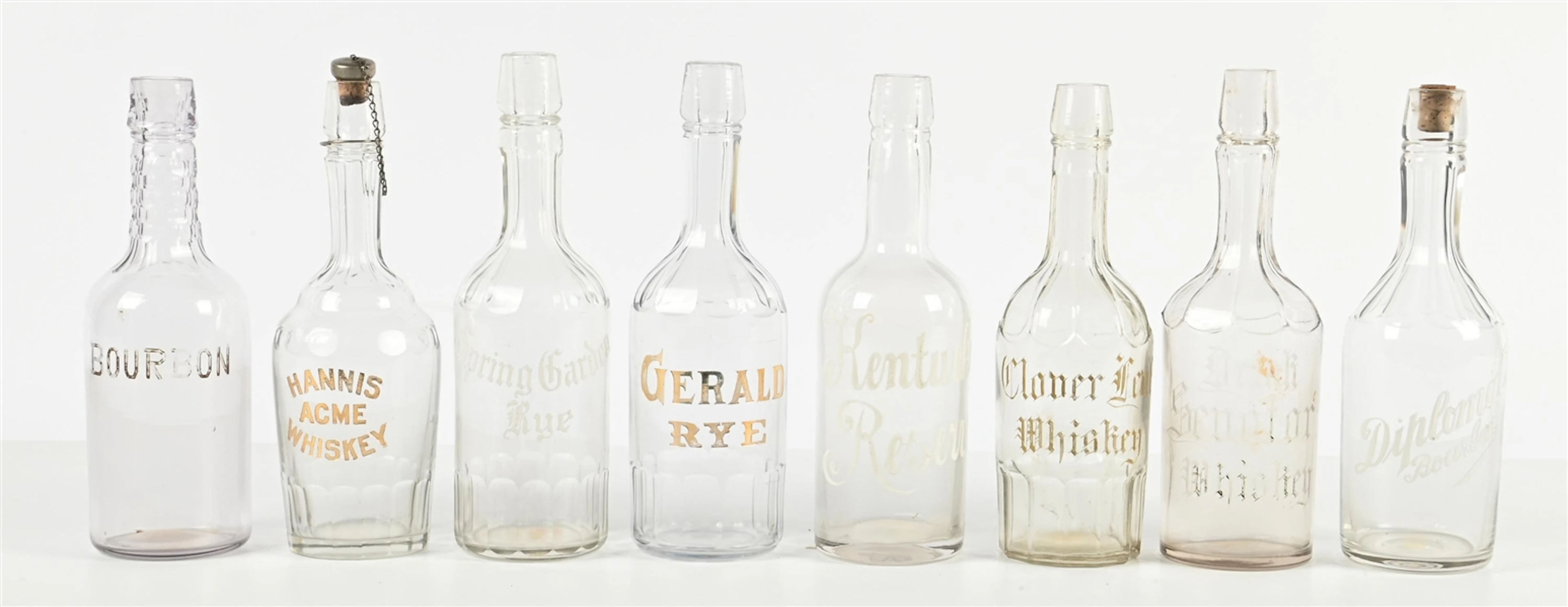 LOT OF (8) PRE PROHIBITION ETCHED GLASS WHISKEY BACK BAR BOTTLES