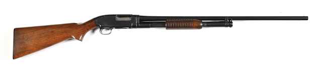 (C) WINCHESTER MODEL 12 SLIDE ACTION 20 GAUGE SHOTGUN.
