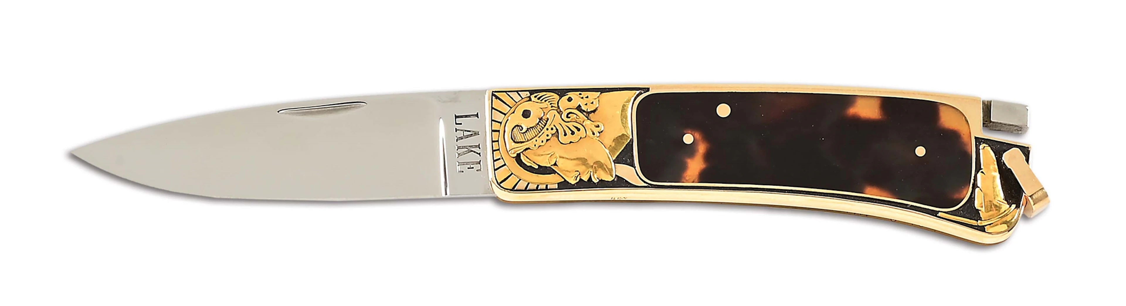 RON LAKE CUSTOM GOLD ENGRAVED FOLDER WITH EXOTIC SCALES.
