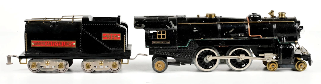 LOT OF 2: AMERICAN FLYER STD-GA. NO. 4694 STEAM LOCOMOTIVE & TENDER